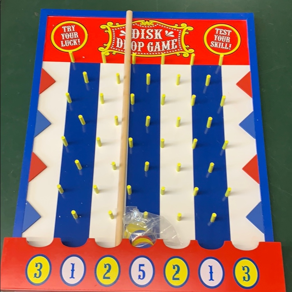 Wood disk drop game circus carnival Plinko style
